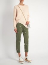STELLA MCCARTNEY Flower-embroidered slim-leg cotton-blend trousers khaki green. Casual fashion | white embroidered flowers | floral embellished pants