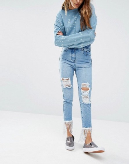 Liquor & Poker Slim Mom Jeans with Sequin Trim in light wash blue denim. Casual fashion | high waisted | fringed hem | destroyed | ripped | distressed rip detail | relaxed fit - flipped