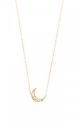 ANDREA FOHRMAN Mini Crescent Necklace. White diamonds | diamond necklaces | small moon pendants | celestial pendant necklaces | luxe jewellery