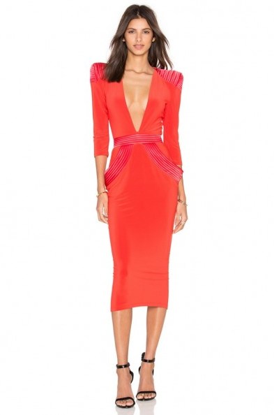 ZHIVAGO Informant Dress in orange. Plunge front midi dresses | padded shoulders | deep V neckline | occasion glamour | glamorous evening fashion | fitted style | party wear | plunging necklines - flipped
