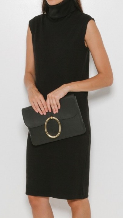 A Detacher ~ Lou black leather clutch bag with brass oval embellishment – large envelope bags – smart luxe handbags - flipped