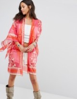 Anna Sui Exclusive Kimono magenta. Pink printed kimonos | semi sheer silk wraps | wrap style jackets | floaty outerwear | luxe style fashion