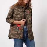 River Island Brown camo badge shacket. On trend womens shackets | shirt/jacket tops | trending fashion | lightweight jackets | casual clothing trends | camouflage print | heavier shirts
