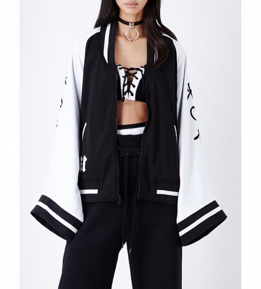 Puma x fenty kimono shell jacket black/white – designer sportswear – sports luxe – kimono style sleeves – casual jackets for autumn – statement leisurewear - flipped