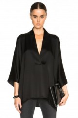 NILI LOTAN BLACK SILK KIMONO TOP WITH ASYMMETRIC HEM. Oriental style fashion | silky designer tops | wide sleeve blouses