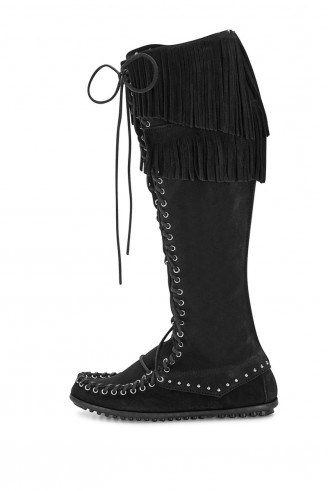 rebecca minkoff x minnetonka knee hi lace up boot in black. Suede knee high flat boots | fringe footwear | winter accessories | fringed lace ups - flipped