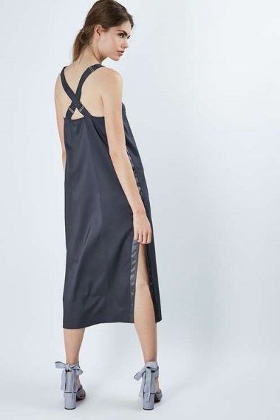 Topshop Satin Dungaree Slip Dress in charcoal. On-trend silky dresses | slinky fabric | cross strap back | midi style | side slit | women’s fashion - flipped