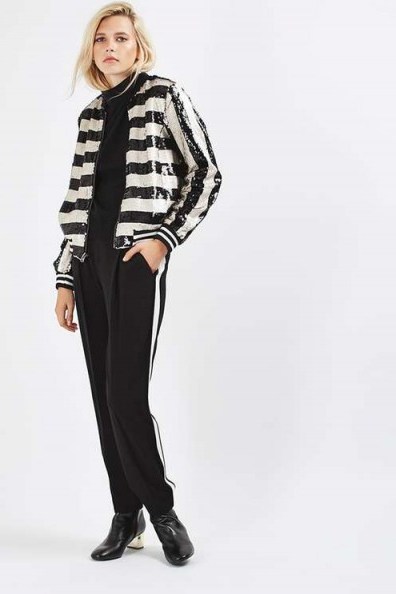 Topshop Stripe Sequin Bomber Jacket as worn by Olivia Palermo at London Fashion Week, September 2016. Casual jackets | sequined outerwear | black and white stripes | on trend fashion - flipped