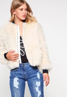 Tommy Hilfiger x GIGI HADID Bomber Jacket in white. Faux fur jackets | fluffy outerwear | on-trend fashion | Autumn/Winter casual style clothing - flipped