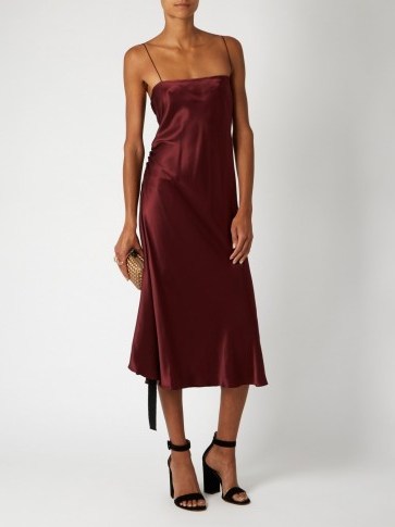 ELLERY Tony ruched-side silk-satin slip dress burgundy. Midi cami dresses | luxe evening fashion | thin straps | spaghetti strap | feminine occasion wear | slinky fabric | ruched side detail - flipped
