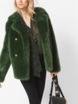 Michael Michael Kors moss-green faux fur peacoat. This coat adds a glamorous touch to any stylish Winter outfit | seasonal wardrobe essential | womens outerwear essentials | warm classic jackets | chic furry jackets | luxe fashion | designer clothing