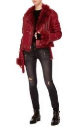 R13 Sac Oversized Shearling Red Motorcycle Jacket – as worn by Gigi Hadid out in Paris during fashion week, September 2016. Celebrity leather biker jackets | star style outerwear | fur moto | what models wear off duty