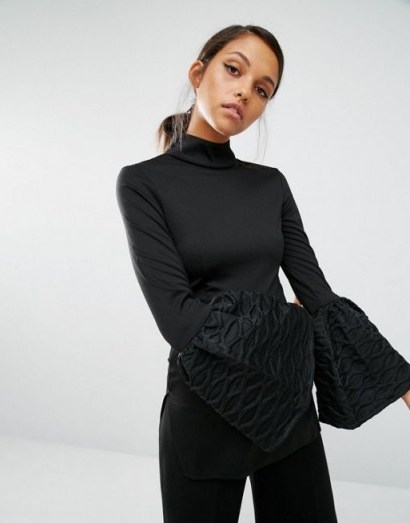 Asilio Loud Play Top in black. High neck tops | on-trend fashion | flared cuffs | bell sleeves | turtleneck - flipped