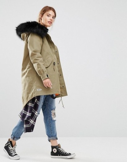 Converse Khaki Shield Parka With Faux Fur Lined Hood in green. Casual jackets | on-trend outerwear - flipped