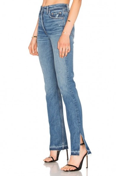 GRLFRND X REVOLVE NATALIA HIGH-RISE SKINNY SPLIT JEAN in The Letter. Blue denim jeans | ankle side slit | raw cut hem | casual fashion - flipped