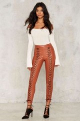 Line & Dot Juniper Corset Leggings in Orange Vegan Leather. Faux leather skinny pants | front lace up trousers | going out glam | evening fashion