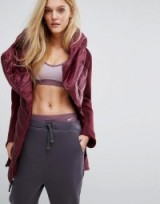 Nike Aeroloft Padded Longline Jacket In Maroon. Winter coats | warm jackets | stylish outerwear | trending fashion