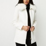 River Island white faux fur collar swing coat. Affordable luxe | winter coats | stylish outerwear | chic fashion