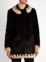 SHRIMPS Bobby faux-fur coat in black and light pink. Luxe coats | fluffy designer jackets | winter outerwear | glam fashion