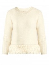 VANESSA BRUNO Fluidity tassel-trimmed wool-knit sweater in cream. Designer knitwear | winter fashion | crew neck sweaters | fringed hem
