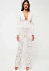 Missguided peace + love white lace plunge jumpsuit. Plunging jumpsuits | deep V front neckline | going out glamour | glamorous fashion
