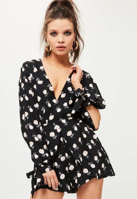 missguided black print split sleeve wrap playsuit. Plunge front playsuits | floral printed fashion | plunging neckline | slip sleeves | tie cuffs - flipped