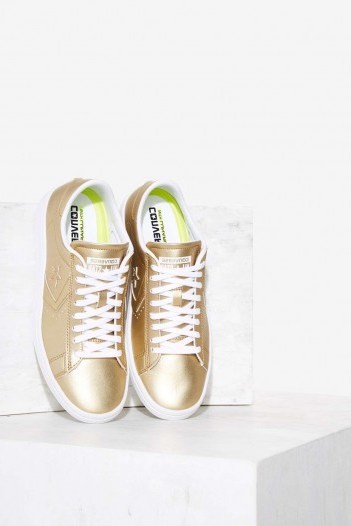 Converse Pro Leather LP OX Vegan Leather Sneaker – Gold. Sneakers | metallic trainers - flipped