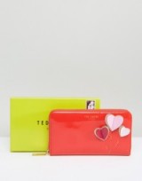 Ted Baker Zip Around Heart Matinee Wallet in bright orange ~ patent wallets ~ purses with hearts ~ accessories