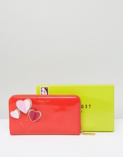 Ted Baker Zip Around Heart Matinee Wallet in bright orange ~ patent wallets ~ purses with hearts ~ accessories - flipped