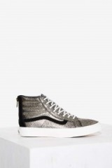 Vans Sk8-Hi Slim Leather Sneaker. Black and gold-tone sneakers | hi top trainers | luxe sports shoes | casual flats