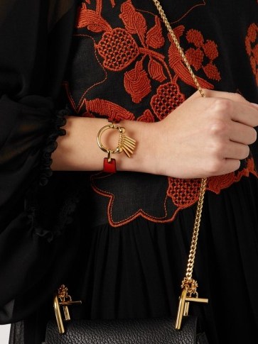 CHLOÉ Marin bracelet. Designer bracelets | modern style jewellery | gold tone brass & red leather - flipped