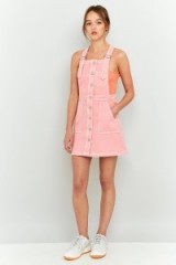 BDG Button Down Pinafore Dress Pink. Denim dresses | pinafores | casual fashion