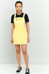 BDG Jessy Pinafore Dress Yellow. Denim pinafores | casual day dresses