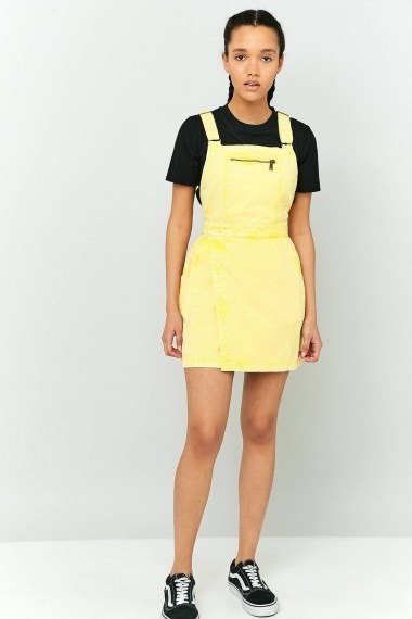 BDG Jessy Pinafore Dress Yellow. Denim pinafores | casual day dresses - flipped