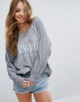 Wildfox Spring Break Sweatshirt in Heather. Long sleeve sweatshirts | casual tops | sports fashion