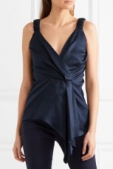 VICTORIA BECKHAM Wrap-effect draped silk-twill top. Dark blue sleeveless tops | plunge V-neck | asymmetric front