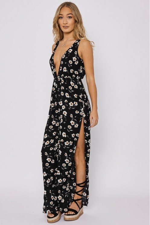in the style CALLY BLACK FLORAL SPLIT LEG PLUNGE JUMPSUIT – plunging jumpsuits – summer fashion - flipped