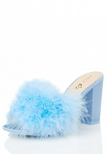 Katy Perry Powder Bon Bon Mules by Katy Perry Collections, worn for an Instagram post, during her Witness World Wide live stream on YouTube, 8-12 June 2017. Celebrity fashion | star style shoes | fluffy blue high heels - flipped