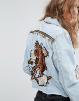 Kiss The Sky Customised Denim Trucker Jacket With Tiger And Coin Embellishment