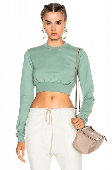 Kendall Jenner marine-green/blue crew neck cropped sweatshirt by DRKSHDW BY RICK OWENS, at LAX airport, 30 June 2017. Celebrity sweatshirts | models off duty fashion | star style tops - flipped