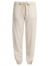 ALLUDE Tie-waist wool and cashmere-blend track pants | sports luxe fashion | cream joggers