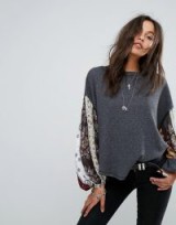 Free People Blossom Bell Sleeve Top | black jersey floral sleeved tops
