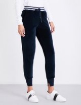 KENDALL & KYLIE Skinny mid-rise velour jogging bottoms | navy joggers | sports luxe pants