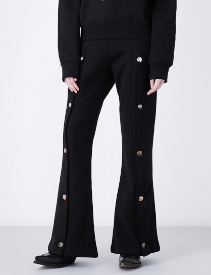 BLINDNESS Flared high-rise cotton-jersey jogging bottoms | black button embellished joggers - flipped