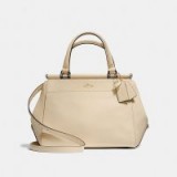 Selena Gomez off-white handbag COACH X SELENA GOMEZ Selena Grace Bag in LIGHT GOLD/SELENA WHITE, out in NYC, 3 October 2017. Star style bags | celebrity handbags