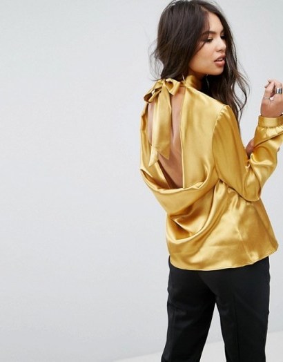 Outrageous Fortune High neck Blouse With Bow Tie Back Detail | silky gold open back blouses - flipped
