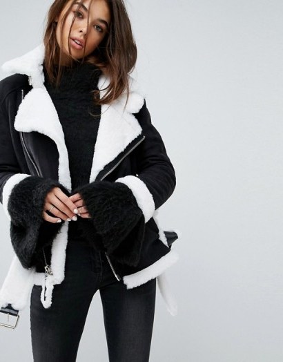 Story Of Lola Faux Shearling Jacket With Contrast Seams – monochrome winter jackets - flipped