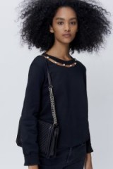 REBECCA MINKOFF PEARL NECKLINE SWEATSHIRT| black embellished sweatshirts | casual luxe