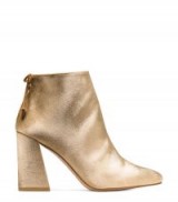STUART WEITZMAN THE GRANDY BOOTIE | gold velvet booties | flared block heel ankle boots | luxe footwear