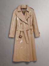 Burberry Raglan-sleeve Laminated Gabardine Trench Coat in Honey / stylish high shine coats